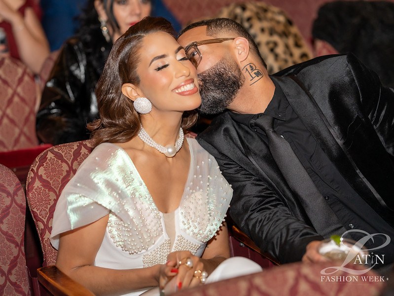 Two guests sharing an affectionate moment at the event
